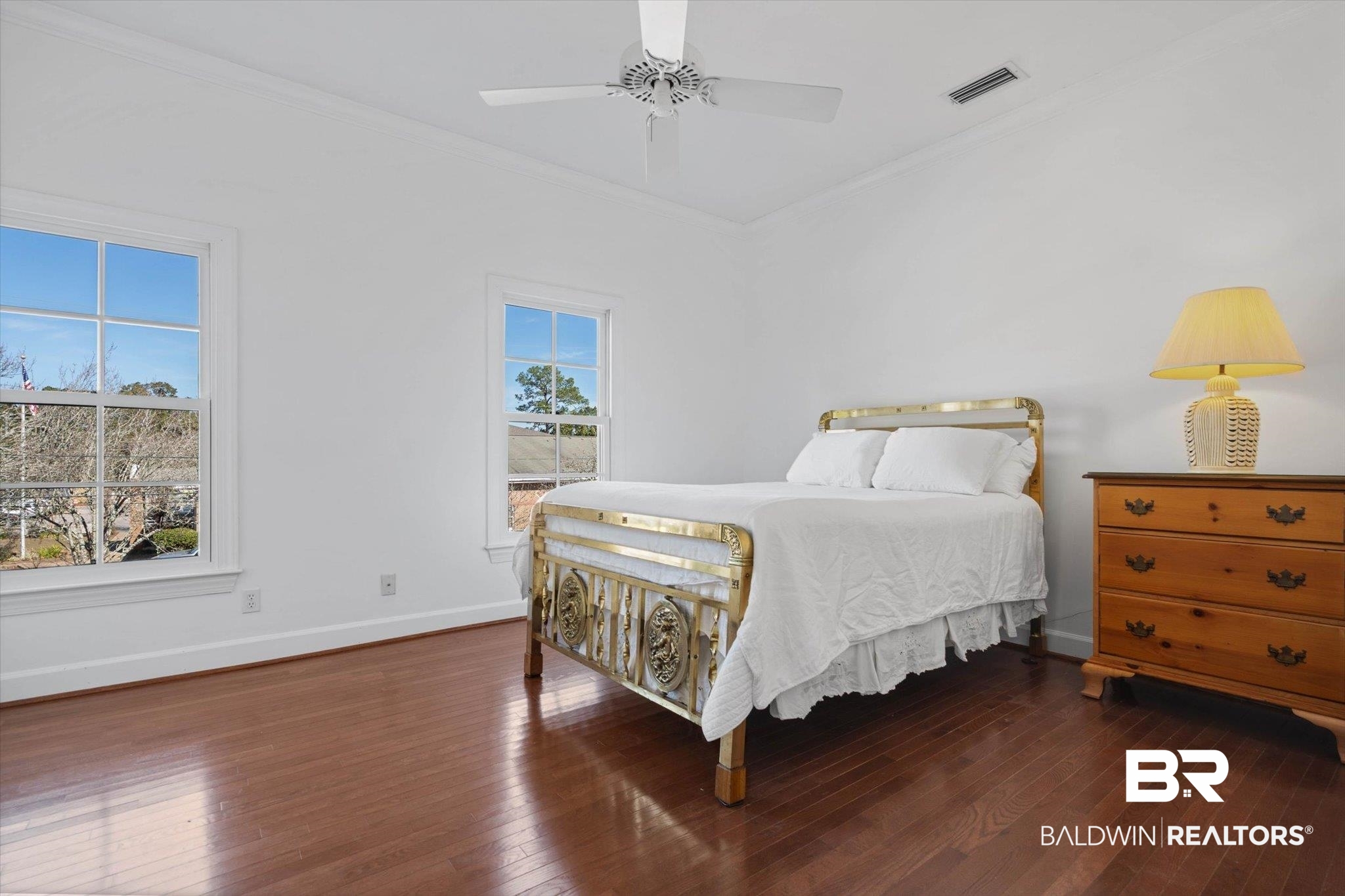 3615 Stein Street Mobile, AL 36608 - Photo 30 of 44 Bedroom featuring dark wood finished floors, ornamental molding, and a ceiling fan