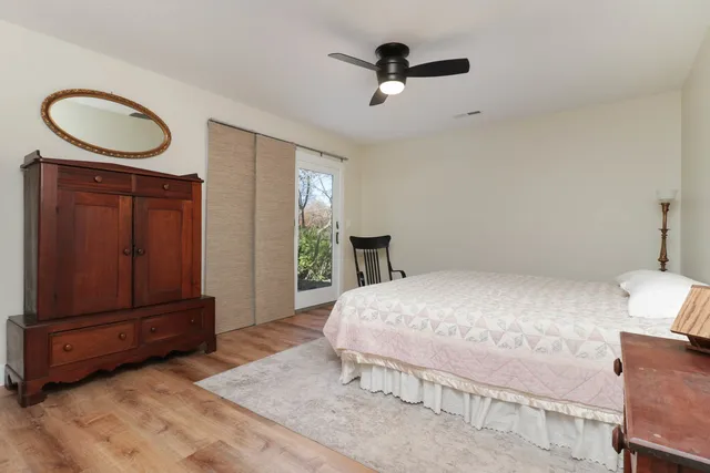 a bedroom with a bed and a cabinets