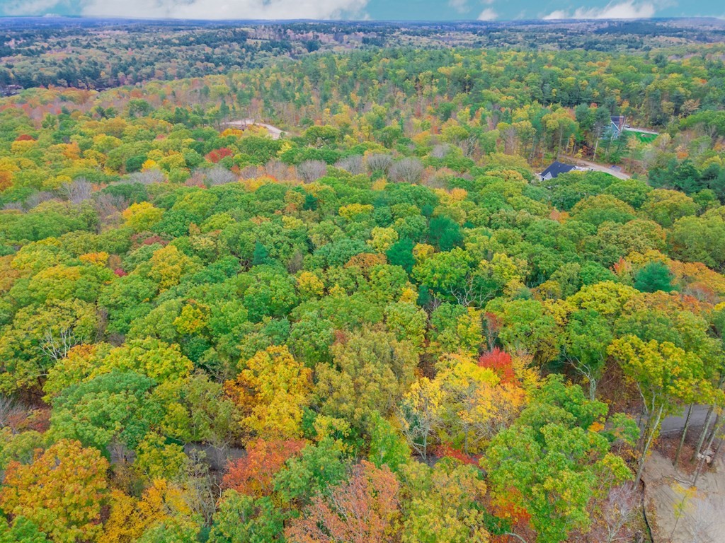 0 Ledgestone Road Douglas, MA 01516 - Photo 4 of 9 a view of a lake with a house