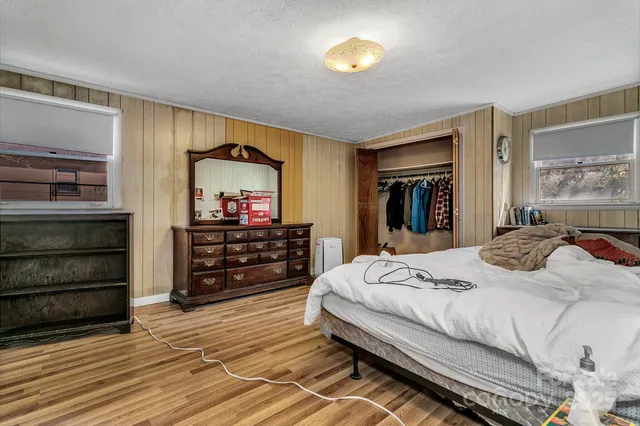 a kitchen with a refrigerator a sink and cabinets