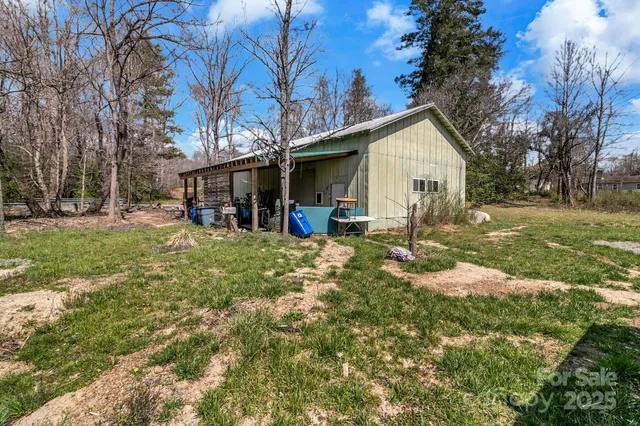 a view of a house with swimming pool