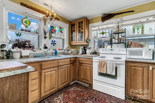 a bathroom with a shower and a sink
