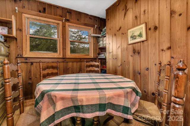 a view of room with furniture and wooden floor