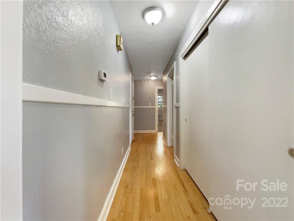 540 Neel Road Salisbury, NC 28147 - Photo 14 of 22 a view of a hallway with wooden floor