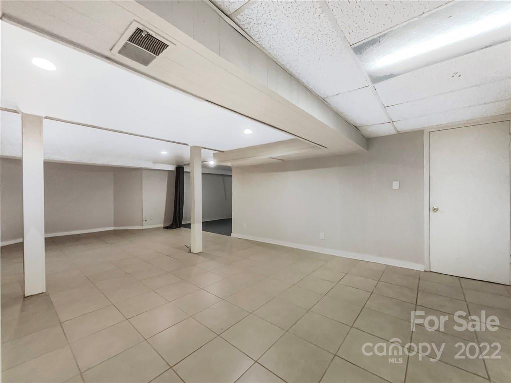 540 Neel Road Salisbury, NC 28147 - Photo 19 of 22 an empty room with windows