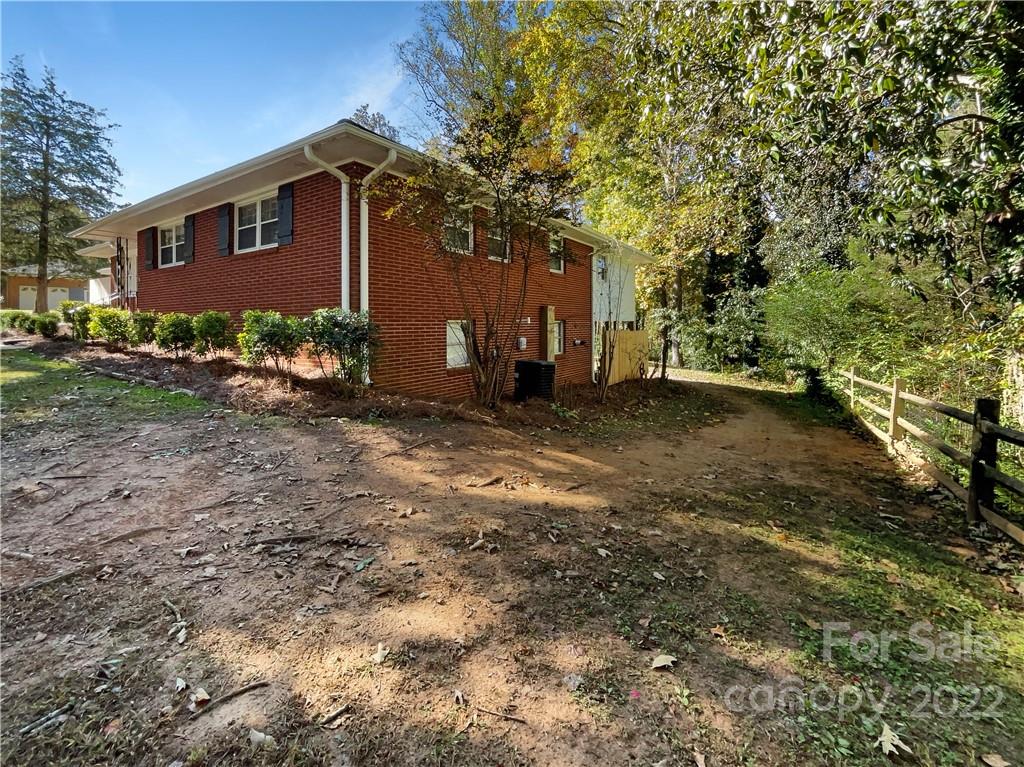540 Neel Road Salisbury, NC 28147 - Photo 22 of 22 a front view of a house with garden
