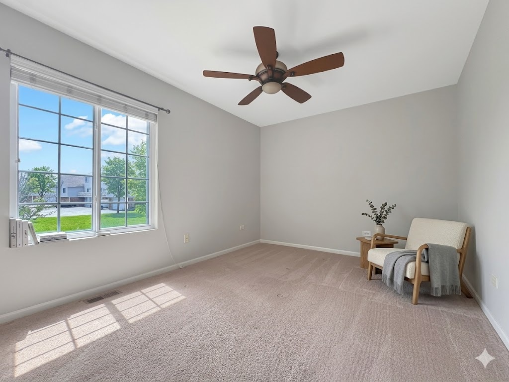 3381 Cameron Drive Elgin, IL 60124 - Photo 17 of 23 a living room with furniture and a window