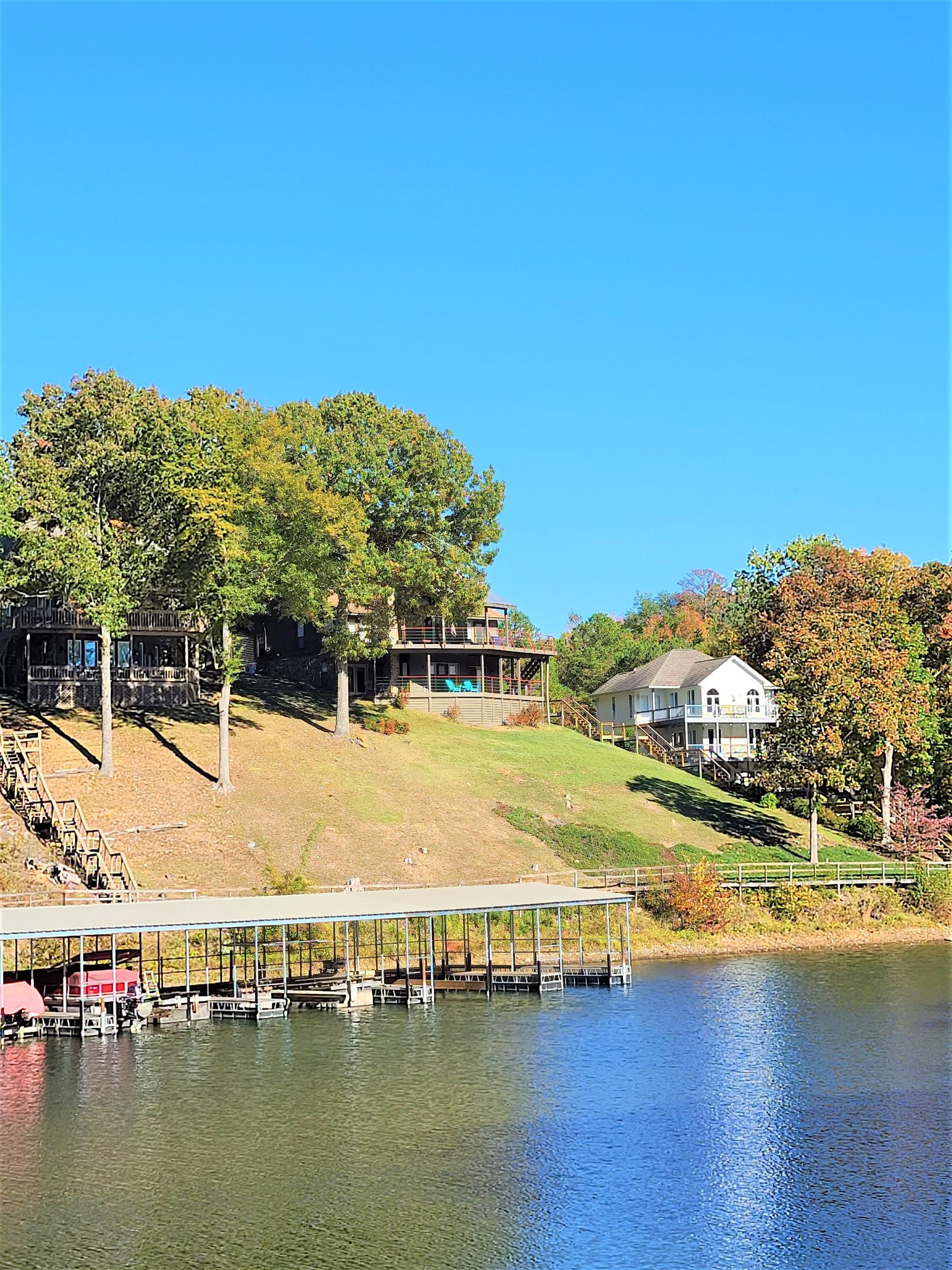 90 Riviera Cove Cherokee, AL 35616 - Photo 1 of 21 a view of an ocean with residential houses