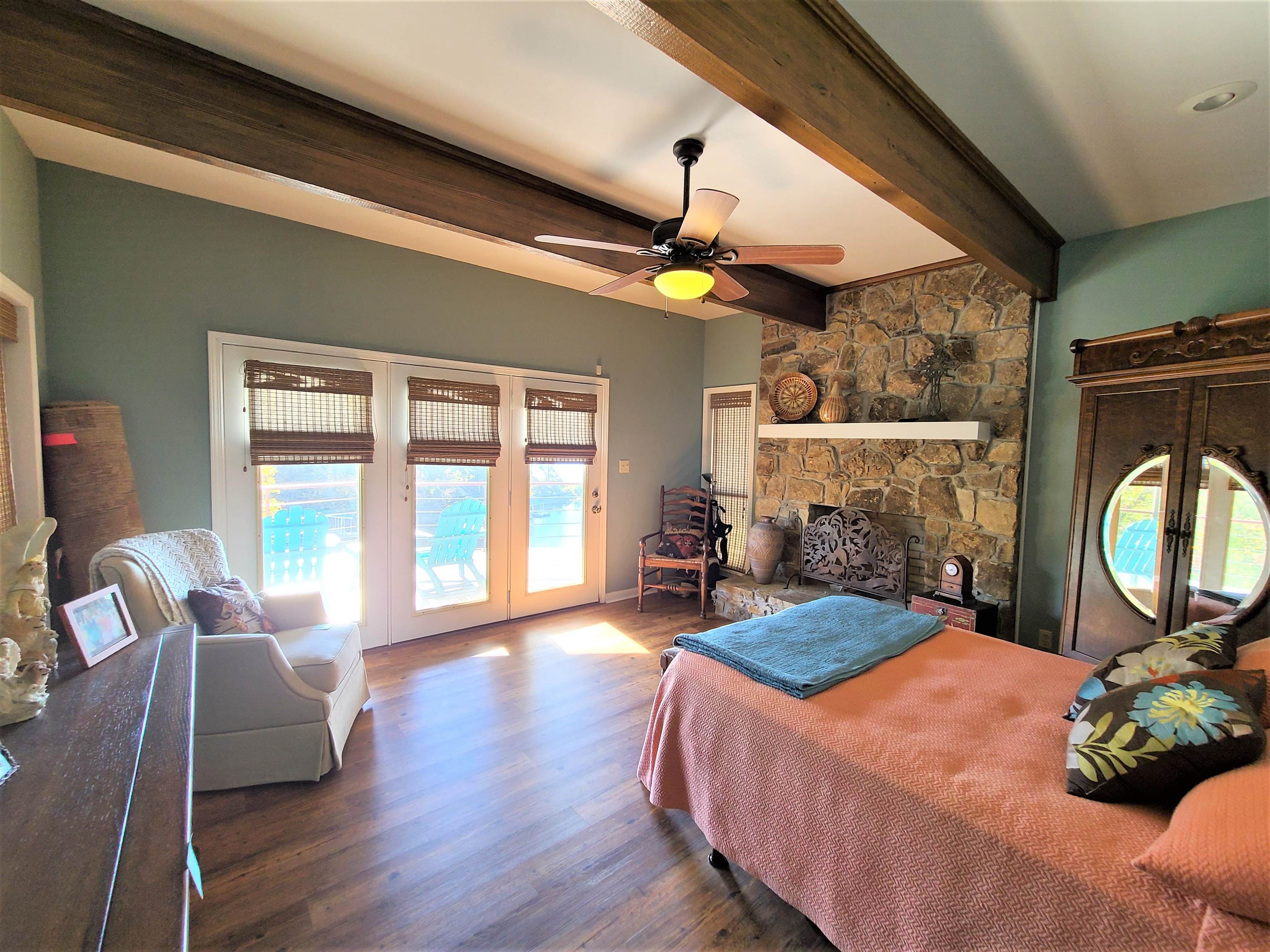 90 Riviera Cove Cherokee, AL 35616 - Photo 13 of 21 a bedroom with furniture and a large window