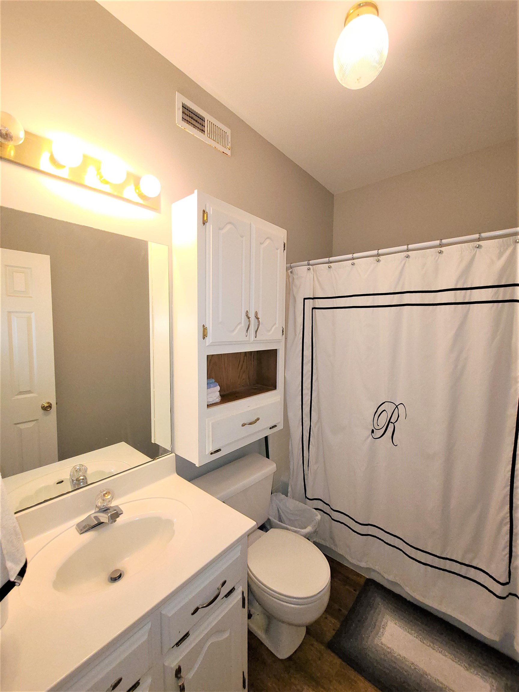 90 Riviera Cove Cherokee, AL 35616 - Photo 17 of 21 a bathroom with a sink toilet and shower