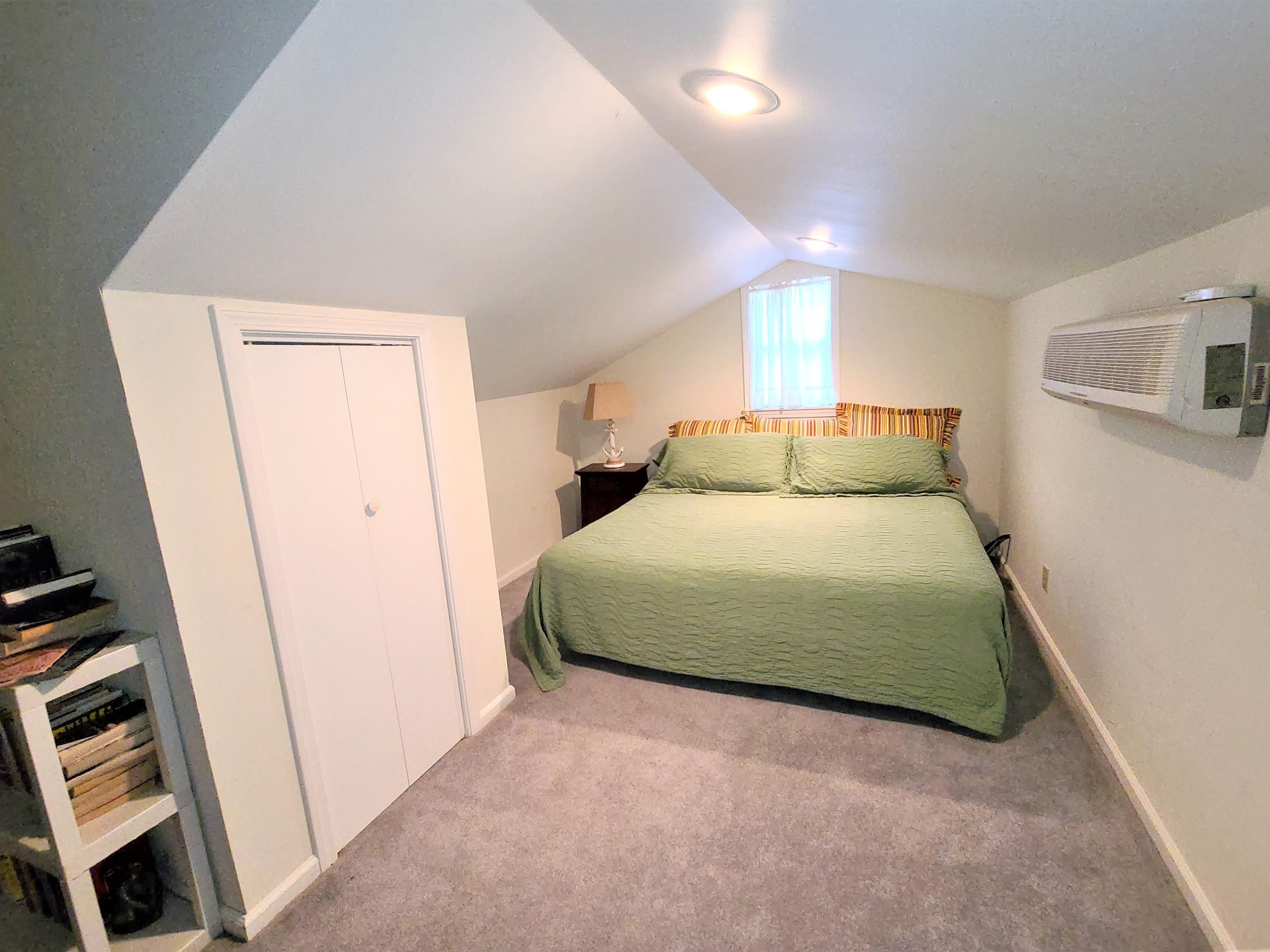 90 Riviera Cove Cherokee, AL 35616 - Photo 19 of 21 a bedroom with a bed and a window