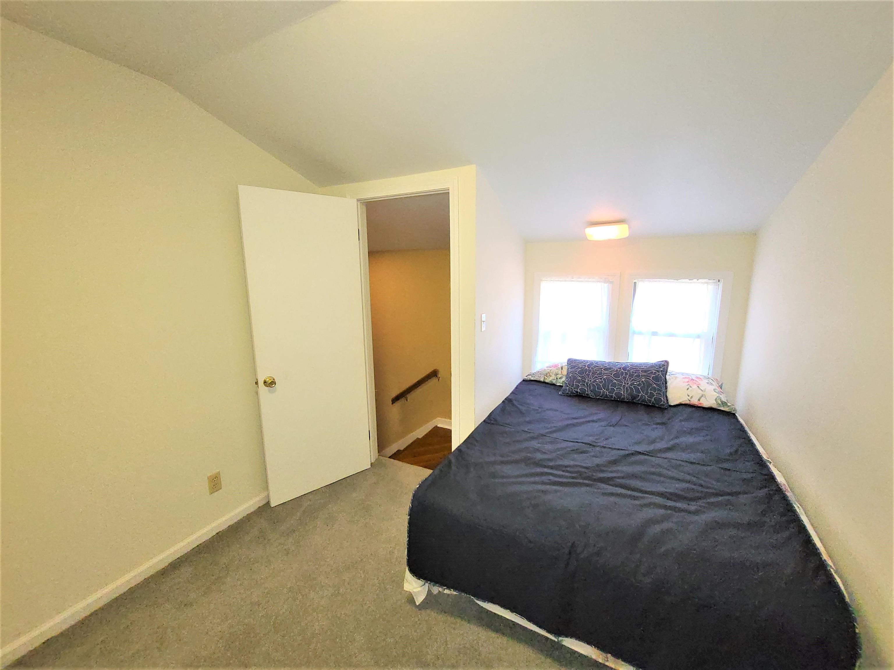 90 Riviera Cove Cherokee, AL 35616 - Photo 20 of 21 a bedroom with a bed and wooden floor