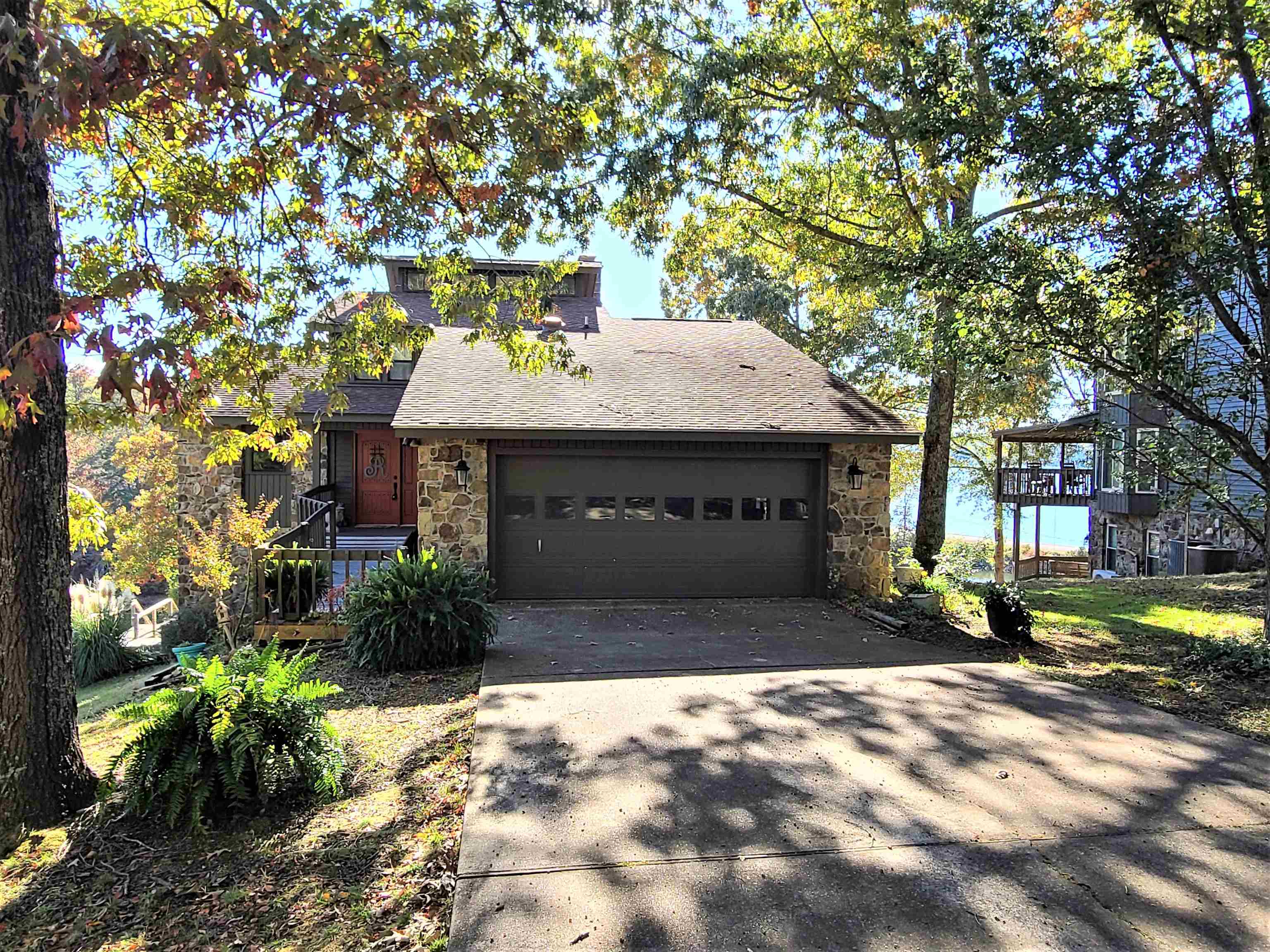90 Riviera Cove Cherokee, AL 35616 - Photo 21 of 21 a view of a house with a yard and tree