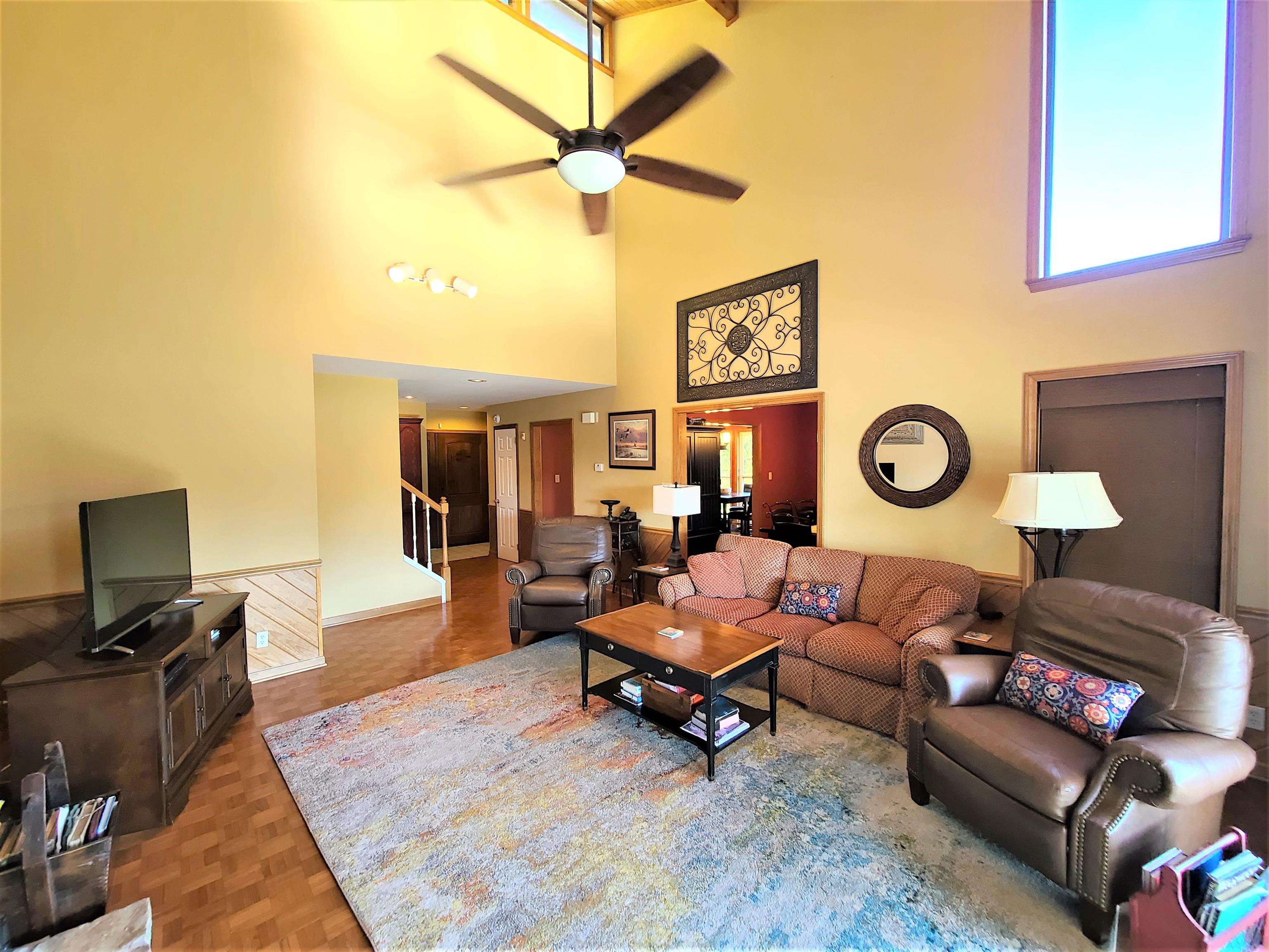 90 Riviera Cove Cherokee, AL 35616 - Photo 8 of 21 a living room with furniture and a flat screen tv