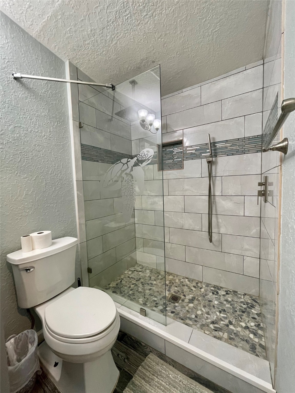 308 Parkview Road Surfside Beach, TX 77541 - Photo 13 of 18 a bathroom with a toilet and shower