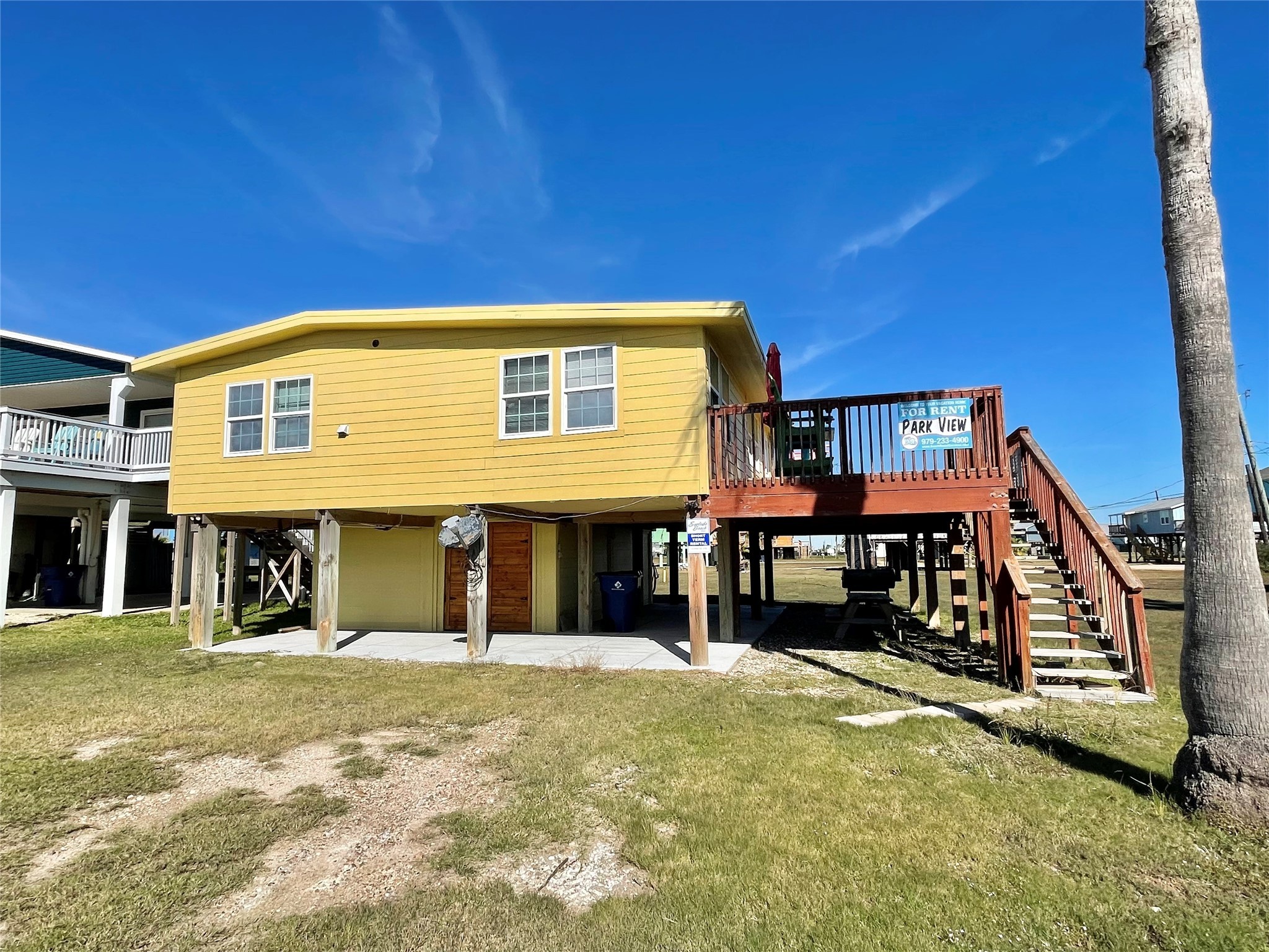 308 Parkview Road Surfside Beach, TX 77541 - Photo 2 of 18 a front view of a house with a yard
