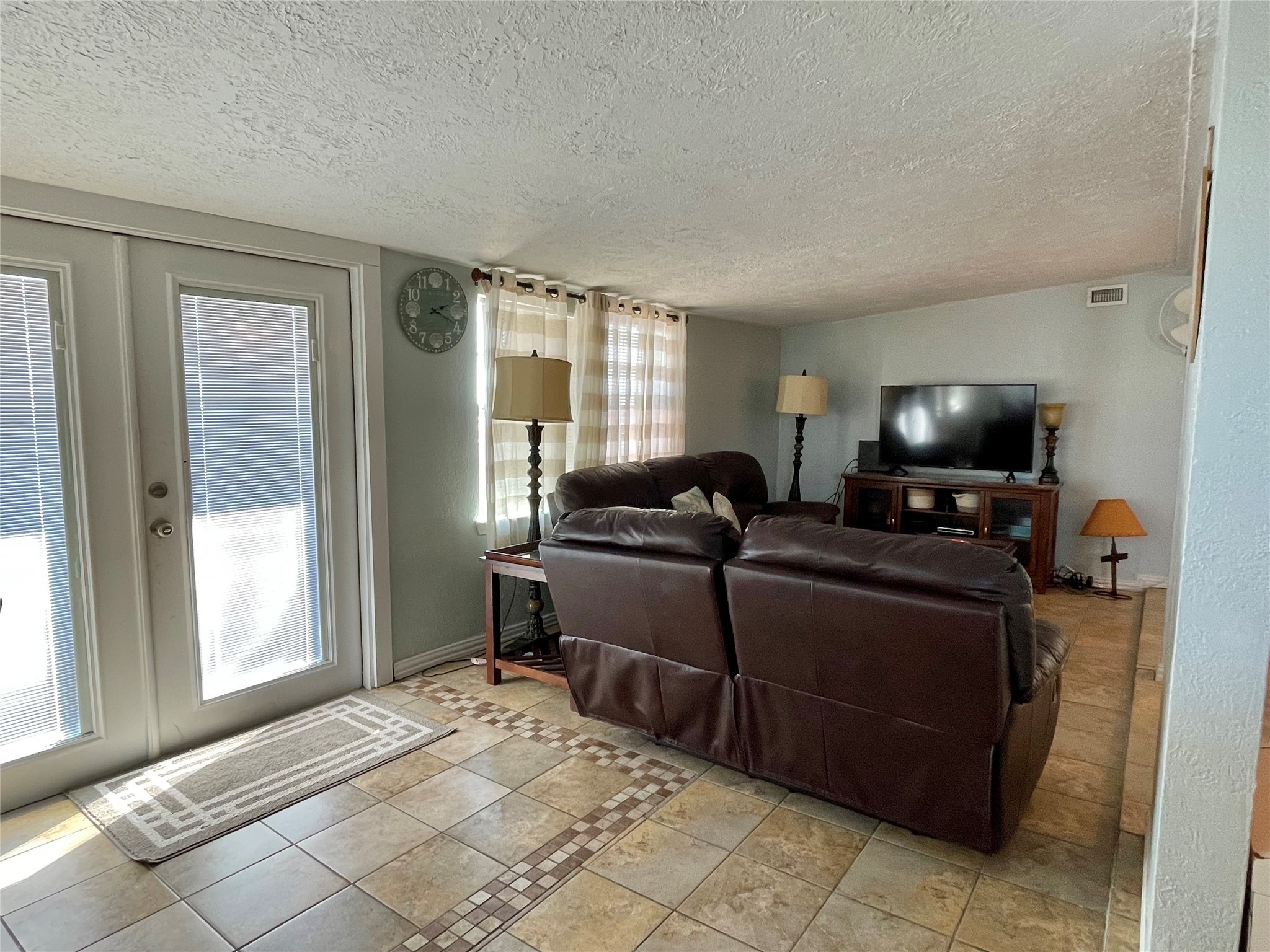 308 Parkview Road Surfside Beach, TX 77541 - Photo 4 of 18 a living room with furniture and a flat screen tv