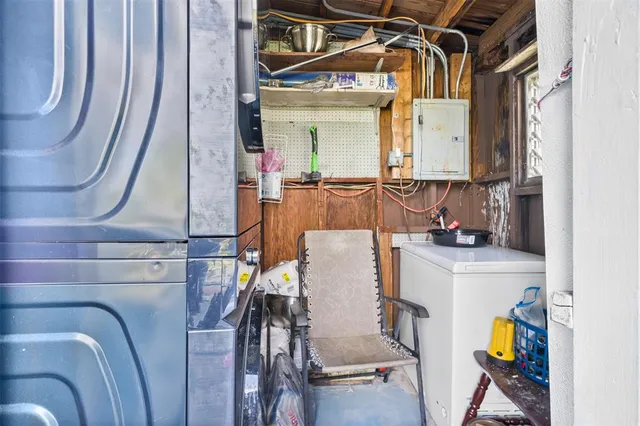 a view of living room with furniture and a window