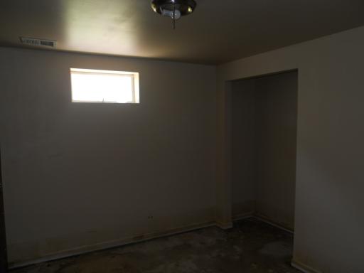 3512 Ronald Road Crete, IL 60417 - Photo 13 of 14 an empty room with a window