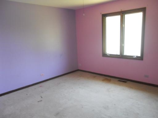 3512 Ronald Road Crete, IL 60417 - Photo 8 of 14 an empty room with a window