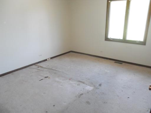 3512 Ronald Road Crete, IL 60417 - Photo 10 of 14 an empty room with a window