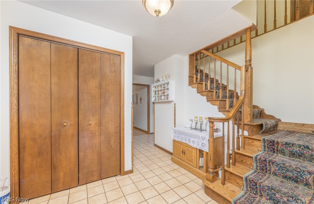 81 James Road Fleming, OH 45729 - Photo 25 of 50 Stairs and entry way closet.