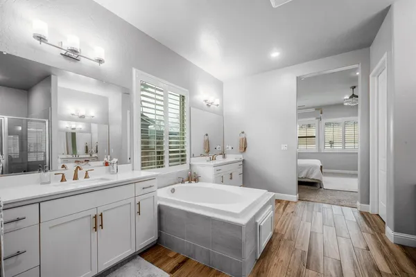 a utility room with sink dryer and washer