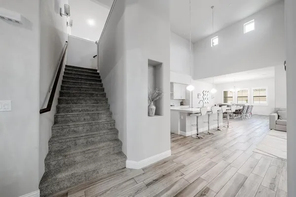 a view of a living room and entryway