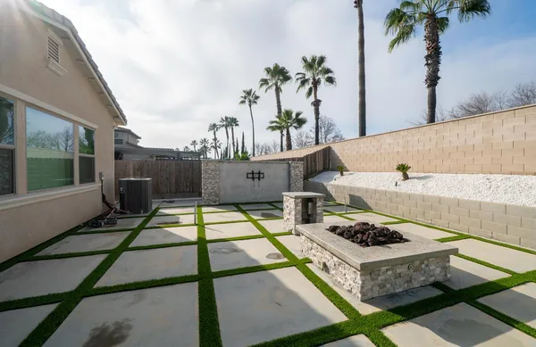 a view of a garden with an outdoor space