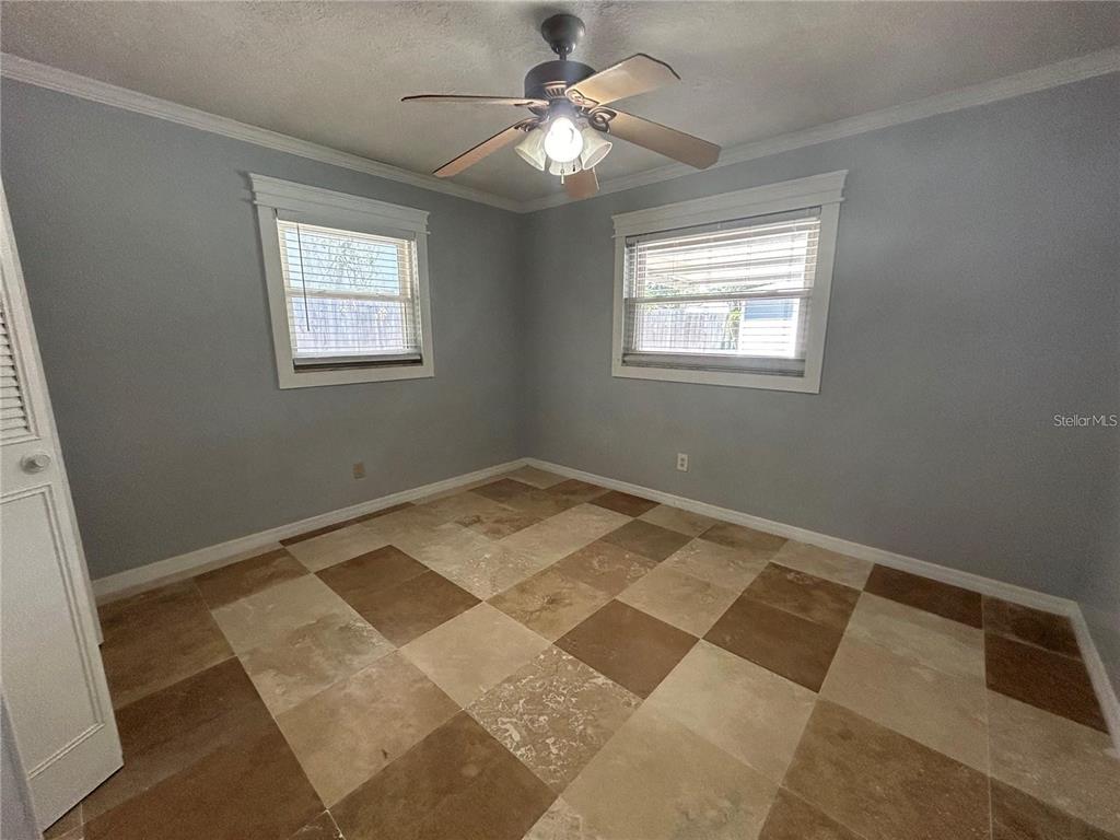 321 Ridgewood Street Altamonte Springs, FL 32701 - Photo 21 of 50 a view of a room with tiles and windows