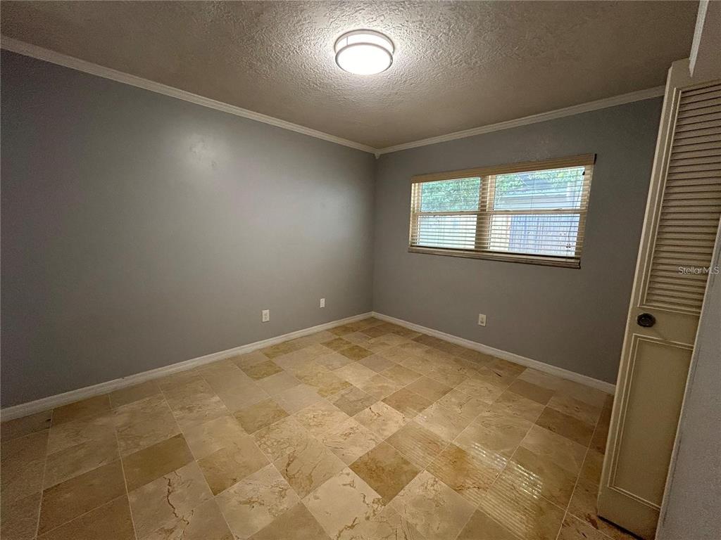 321 Ridgewood Street Altamonte Springs, FL 32701 - Photo 23 of 50 en empty room with windows