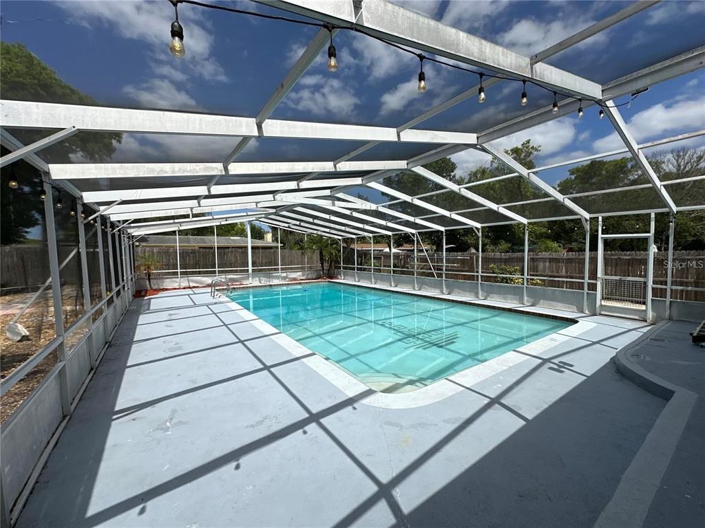 321 Ridgewood Street Altamonte Springs, FL 32701 - Photo 34 of 50 a view of house with a swimming pool