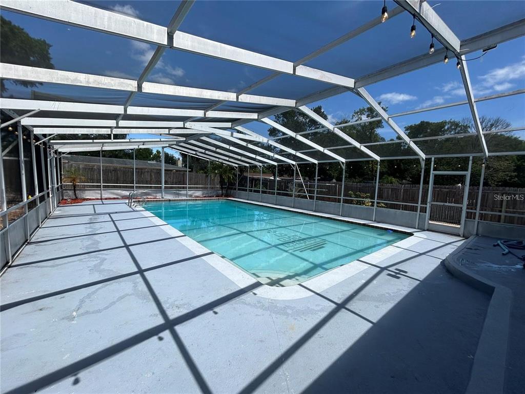 321 Ridgewood Street Altamonte Springs, FL 32701 - Photo 36 of 50 a view of a backyard with wooden floor and iron fence