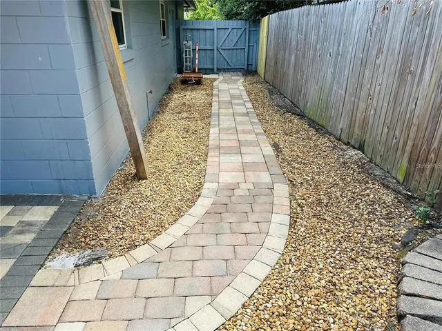 a view of a pathway door with wooden floor