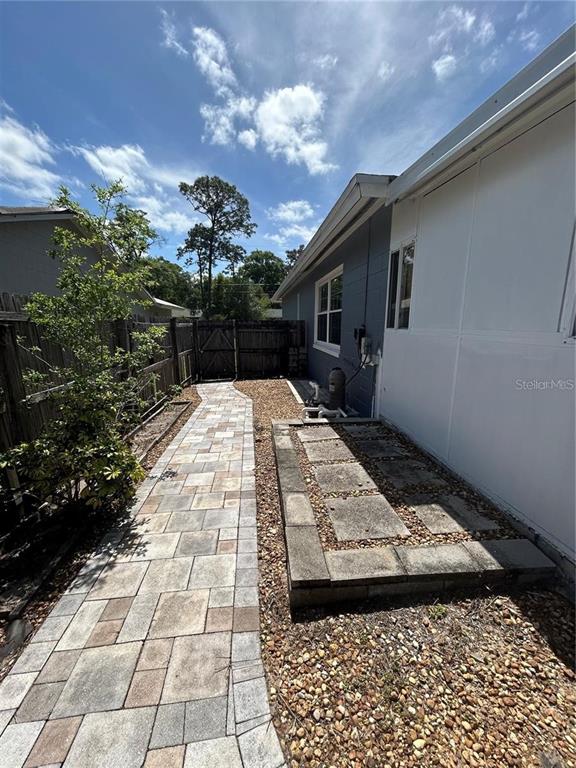 321 Ridgewood Street Altamonte Springs, FL 32701 - Photo 47 of 50 a view of a backyard of the house