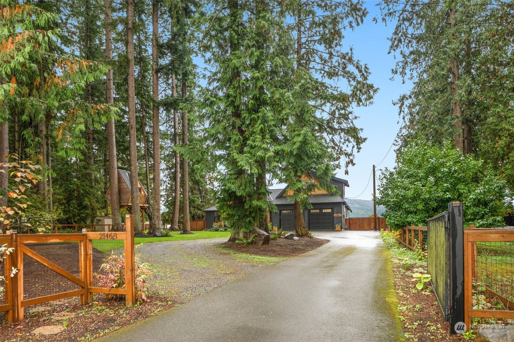 21468 Calhoun Road Monroe, WA 98272 - Photo 31 of 36 a view of a street with large trees