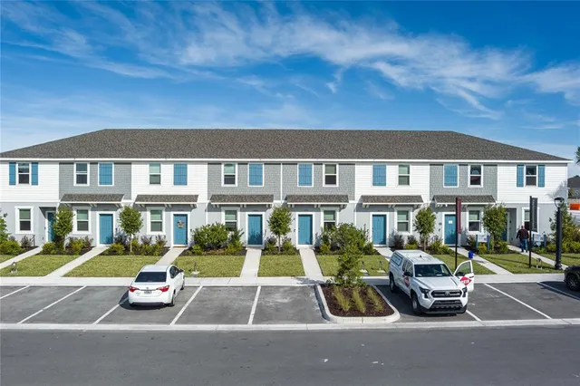 a car parked in front of a buildings