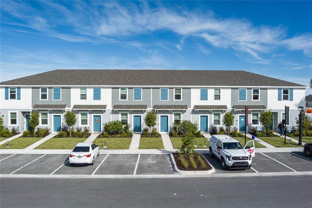 a car parked in front of a buildings