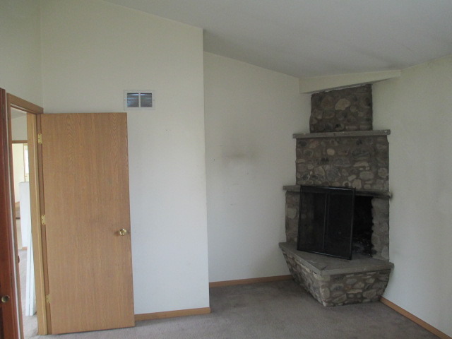 35322 North Wilson Road Ingleside, IL 60041 - Photo 5 of 18 a living room with furniture and a fireplace
