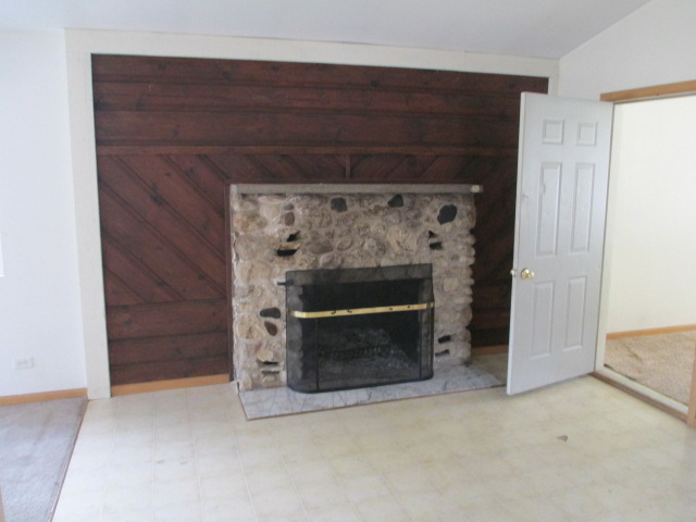 35322 North Wilson Road Ingleside, IL 60041 - Photo 10 of 18 a room with a fireplace