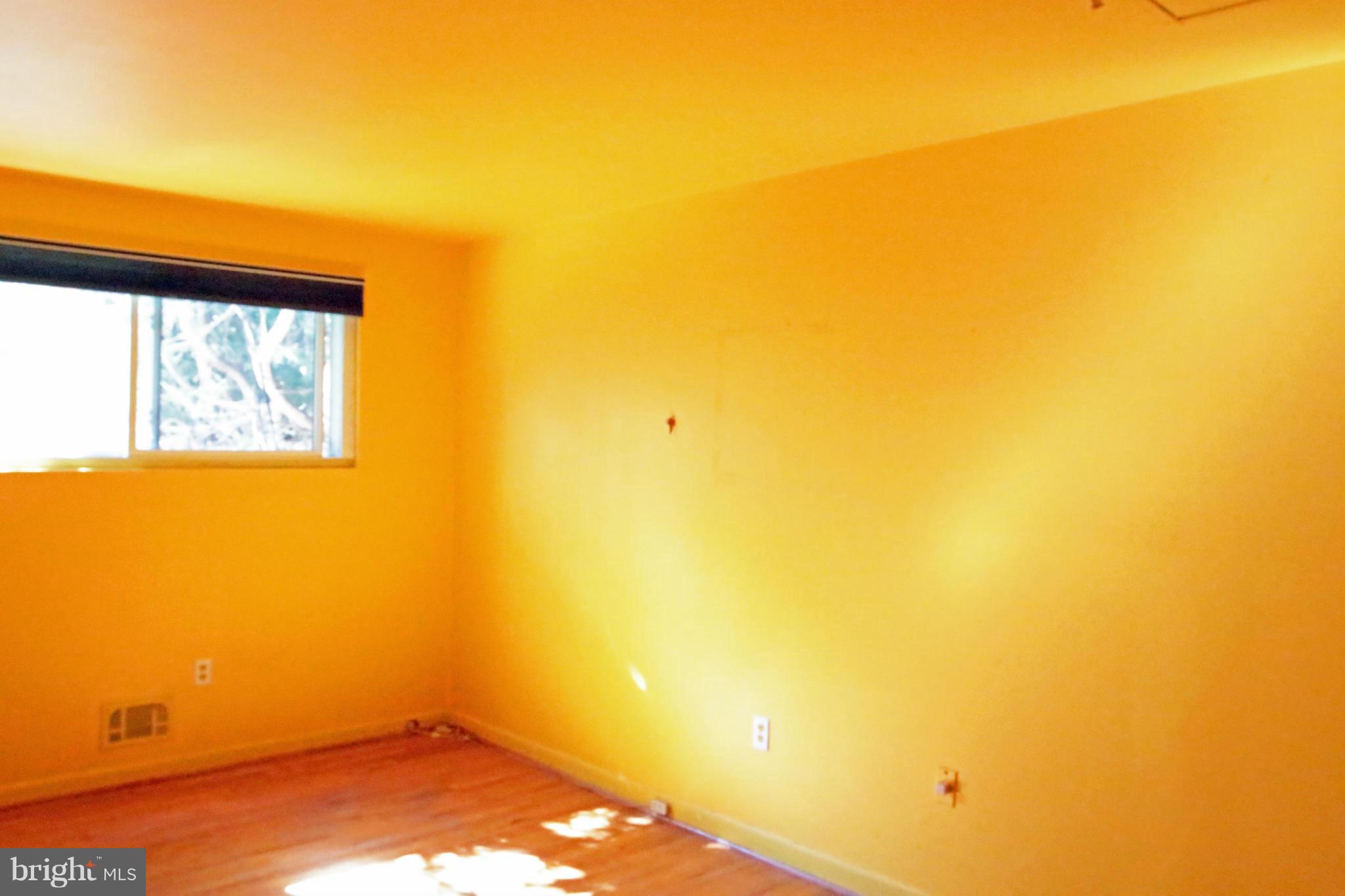 8131 Scotts Level Road Baltimore, MD 21208 - Photo 19 of 29 a view of a small space with wooden floor and small space