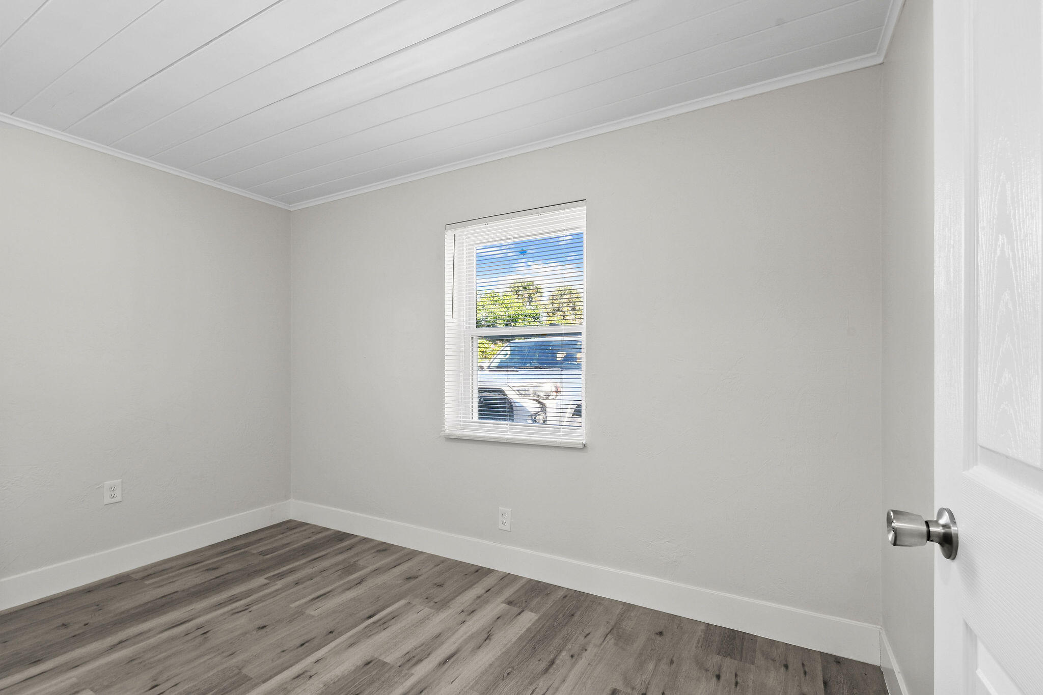 1301 West 25th Street Riviera Beach, FL 33404 - Photo 26 of 34 an empty room with a window