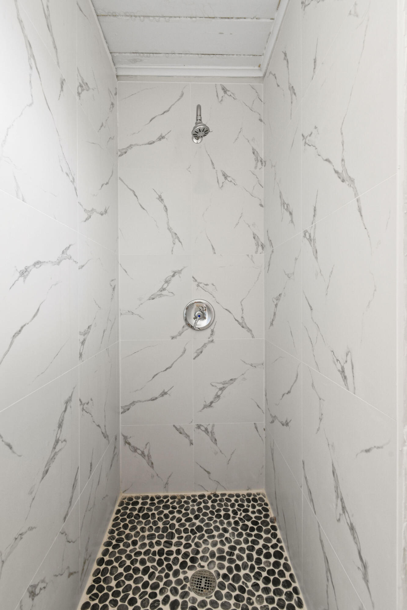 1301 West 25th Street Riviera Beach, FL 33404 - Photo 31 of 34 a bathroom with a shower