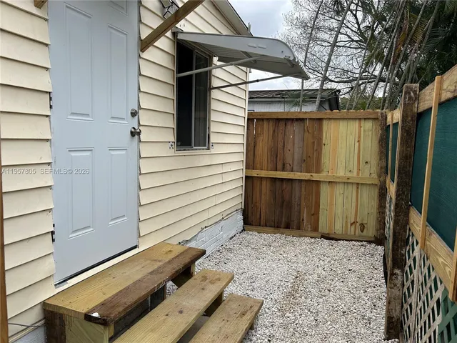 a view of a house with a wooden door