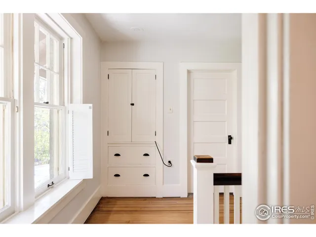 a view of bathroom with bathtub and windows