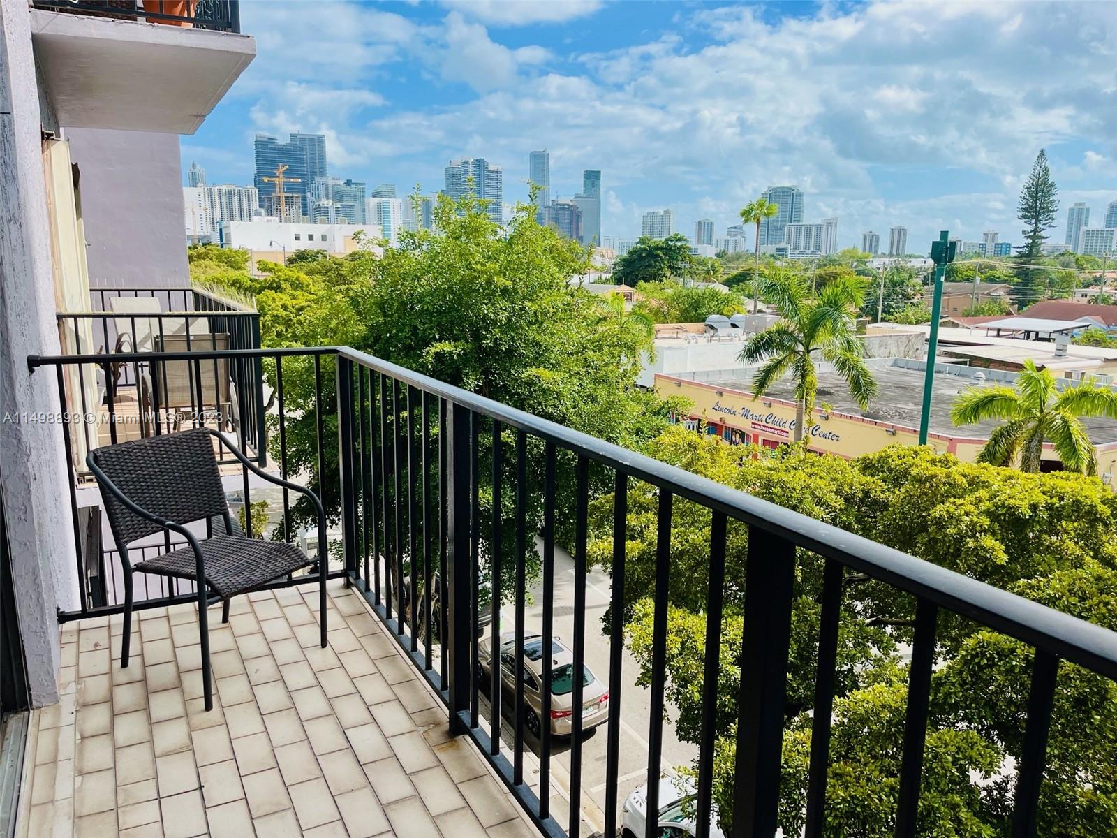 777 Southwest 9th Avenue, Unit 413 Miami, FL 33130 - Photo 1 of 36 a view of a balcony with chairs