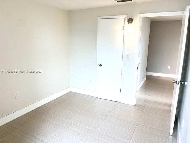 777 Southwest 9th Avenue, Unit 413 Miami, FL 33130 - Photo 21 of 36 a view of an empty room