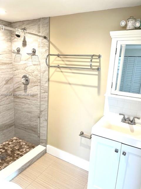 777 Southwest 9th Avenue, Unit 413 Miami, FL 33130 - Photo 25 of 36 a bathroom with a sink and a shower