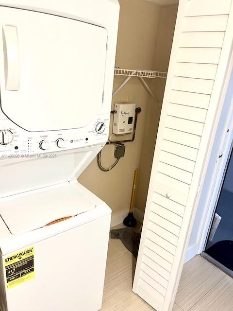 777 Southwest 9th Avenue, Unit 413 Miami, FL 33130 - Photo 26 of 36 a utility room with dryer and washer