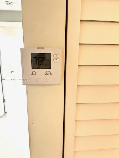 777 Southwest 9th Avenue, Unit 413 Miami, FL 33130 - Photo 27 of 36 a view of a storage & utility room with a washer and dryer